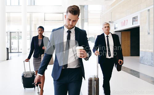 Image of Travel, international meeting and business people walking in hotel, airport and reception area with suitcase. Teamwork, collaboration and group of managers travelling for global business meeting