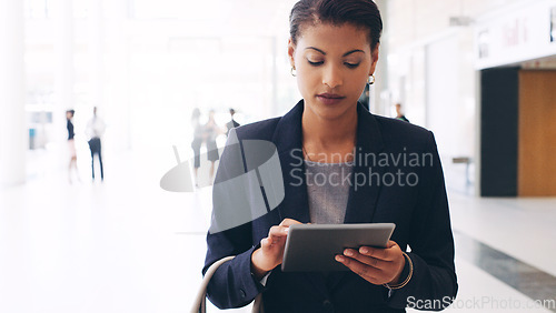 Image of Business woman, tablet and walking to travel while online to check schedule, flight time or make booking at conference hall. Female entrepreneur with technology for project management or report
