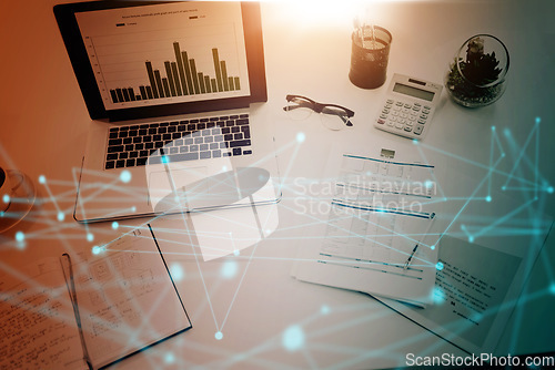 Image of Business laptop screen, digital chart overlay and finance report for company profit with information technology innovation lens flare. Accounting, financial data network graphic marketing background