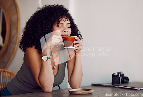 Image of Black woman, smelling or coffee cup in restaurant, cafe or coffee shop for organic chai, matcha or local retail caffeine. Smile, happy or relax bistro customer, student or entrepreneur or morning tea