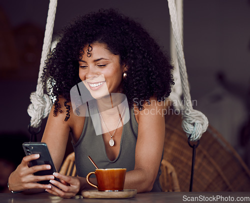 Image of Black woman, phone and coffee in cafe, restaurant or coffee shop on social media, internet news or fun esports game. Happy smile, relax afro student and entrepreneur with tea cup or mobile technology