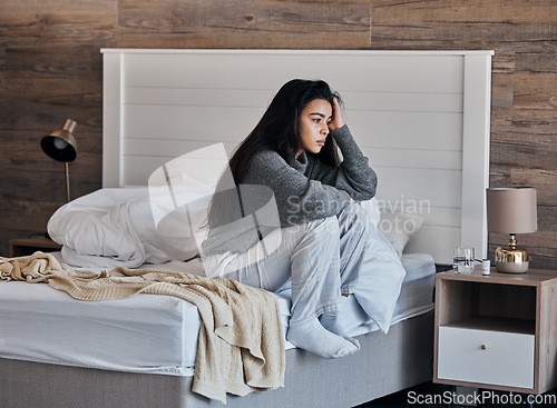 Image of Insomnia, depression and woman in bedroom wake up or thinking of mental health problem, anxiety and morning fatigue. Depressed, stress and tired girl on her bed with psychology risk, sad or trauma