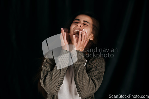 Image of Woman, stress or screaming on black background in studio in mental health, anxiety or bipolar disorder rehabilitation. Anxiety, shouting or depression for burnout person on psychology mockup backdrop