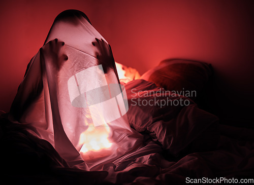 Image of Ghost, sheet and red light in bedroom for scary story, horror and evil at night with human silhouette. Person in home bedroom for thriller, creepy and Halloween background with insomnia fear for dark