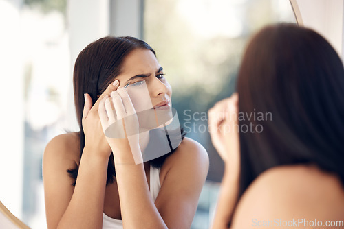 Image of Beauty, tweezer and woman in a mirror for cleaning, grooming and morning routine in a bathroom. Face, hair removal and unhappy girl with tweezers for hygiene, treatment and skincare with mockup