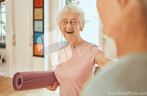 Image of Yoga, fitness and workout with a senior woman holding an exercise mat in a class for wellness. Pilates, training and holistic with a mature female in a studio for mental health or lifestyle balance