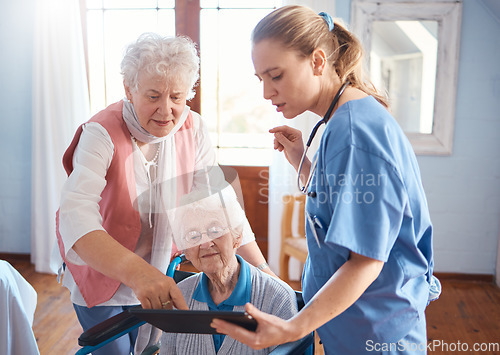 Image of Doctor, tablet and visit for elderly care, consultation or healthcare diagnosis at old age home. Nurse or medical therapist working with touchscreen helping or consulting senior patient in wheelchair