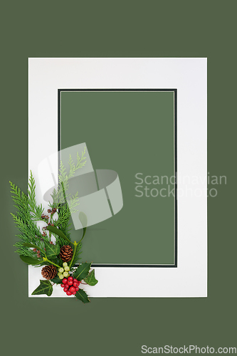Image of Traditional Christmas Background Frame with Winter Holly and Flo