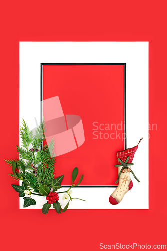 Image of Christmas Retro Stocking and Winter Greenery Background