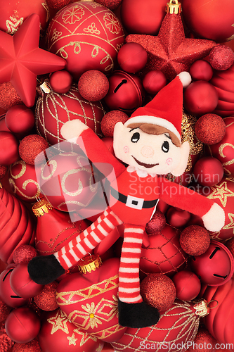 Image of Christmas Elf Toy and Red Bauble Tree Decorations