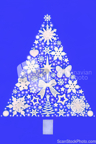 Image of Christmas Tree Surreal Design with Snow and White Bauble Decorat