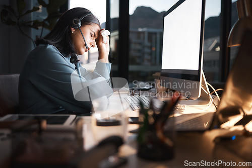 Image of Headache, call center and business woman in night office for global telemarketing, customer support and software consultant job. burnout, depression and tired virtual, financial and insurance advisor