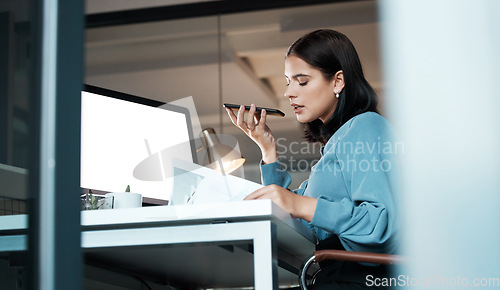 Image of Business woman, phone and voice recording at the office for communication, discussion or marketing idea. Female employee having a corporate conversation on speaker or phone call at the workplace