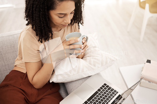 Image of Relax, black woman and tea at laptop streaming app movie, series or tutorial on home couch. Tech, subscription and internet connection of girl on sofa watching online leisure entertainment.