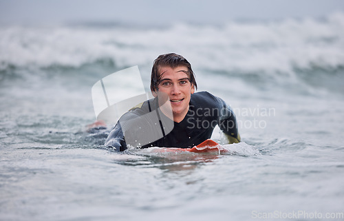 Image of Portrait, man and surfing, ocean waves and water, summer freedom and happiness outdoors. Happy surfer guy on board, beach and sea, relax and happiness, sports adventure and vacation, swimming and sun