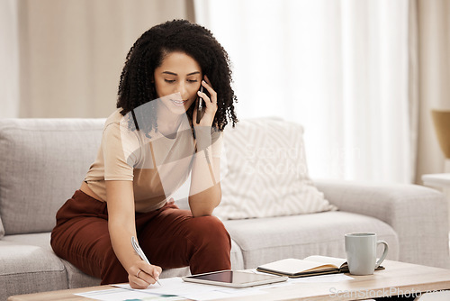 Image of Phone call, documents and writing with a woman freelancer remote working from home on her startup business. Communication, coffee and technology with a female entrepreneur at work in the living room