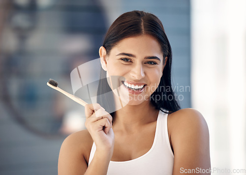 Image of Oral health, healthy teeth and woman with toothbrush, dental care, hygiene and grooming with fresh breath. Clean, smile and wellness with mouth care product and whitening for strong gums in portrait.