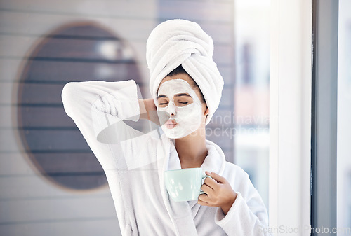 Image of Woman, facial and drinking coffee after morning shower, happy wellness and healthy skincare cosmetics in home bathroom. Funny, pout lips and young female, face mask and clean beauty cosmetology