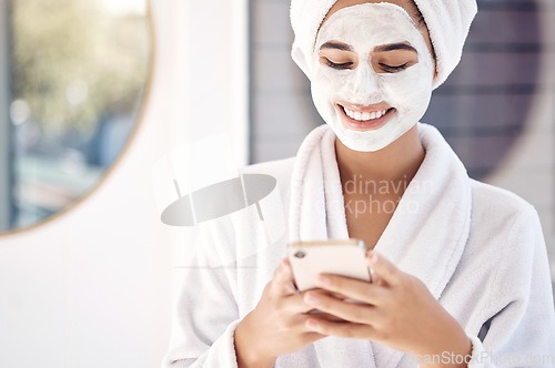 Image of Skincare, face mask and woman on smartphone for social media cosmetics review, blog post and search dermatology benefits online. Beauty, facial product and girl using phone for morning results update