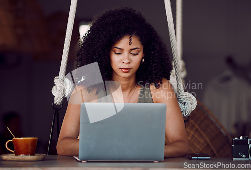 Image of Laptop, freelance photographer woman in cafe and writing article, internet research or checking social media. Freelancer photo journalist reading or typing email for creative project in coffee shop.