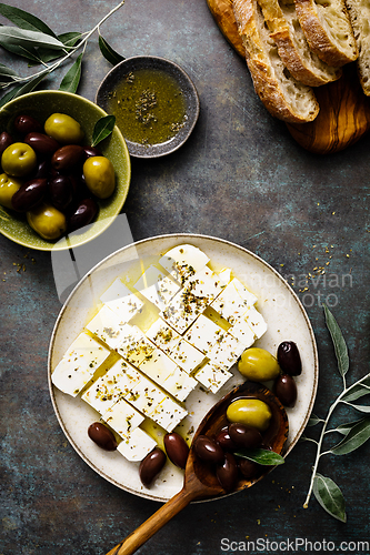 Image of Feta cheese, olives and ciabatta, top view