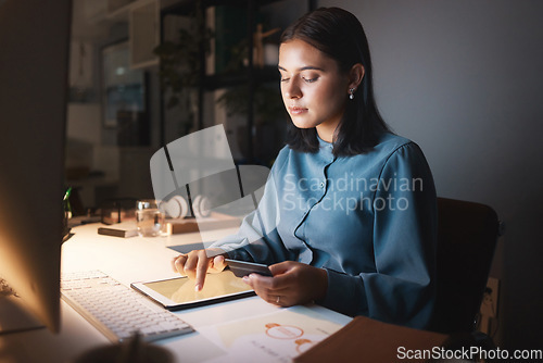 Image of Online shopping, night and business woman with tablet typing in credit card details, payment and account data. Ecommerce, digital technology and girl by desk in dark office doing internet banking