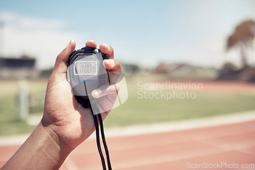 Image of Sport, coach and closeup of hand with stopwatch for time, training and speed of athlete, runner or race. Mentor, trainer and digital clock, watch or timer for fast running on track, field or stadium