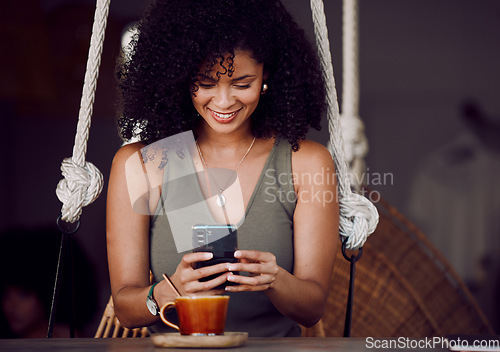 Image of Coffee shop, online and black woman with coffee and phone in hand enjoy freedom, weekend and vacation. Happiness, relax and girl using smartphone for social media, typing message and internet in cafe