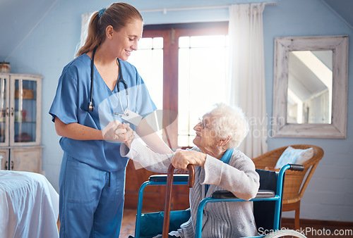 Image of Senior woman, wheelchair and nurse for holding hands, disability support or nursing home. Elderly lady, doctor and consulting for help, advice or physiotherapy in elderly care, clinic or smile at job