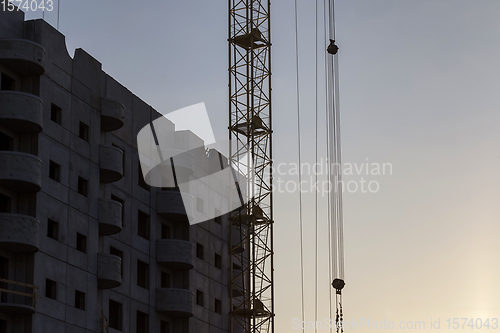 Image of tall yellow construction crane
