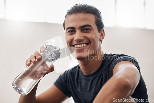 Image of Fitness, happy portrait or man with water bottle in exercise, training or cardio workout in gym. Smile, freedom or athlete face for sport health energy, wellness motivation or drinking water to relax