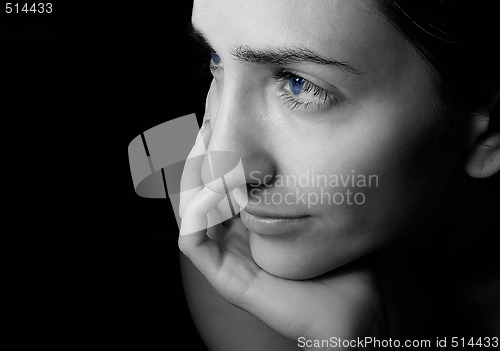 Image of Blue-eyed girl with an easy smile on the lips