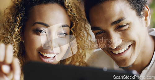 Image of Couple, tablet technology and smile for social media, internet or funny web post together. Happy latino man, woman and relax, laugh and smile with online subscription watching movie or video on app