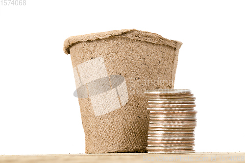 Image of pots with cash