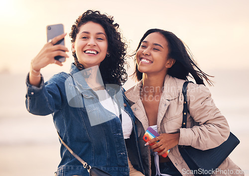Image of Black woman, friends and selfie at beach for sunset, bonding and summer happiness after work together. Women, smartphone and happy photo for social media, summer and ocean in dusk sunshine with smile