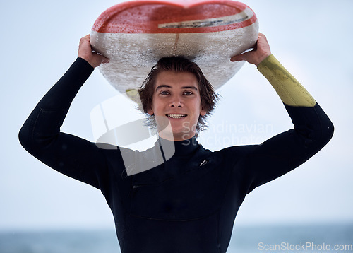 Image of Portrait of happy surfer, man with surfboard and ocean surfing sport outdoors for free fitness, exercise and water training. Beach surf, sea wetsuit and fun Australia summer wellness freedom workout