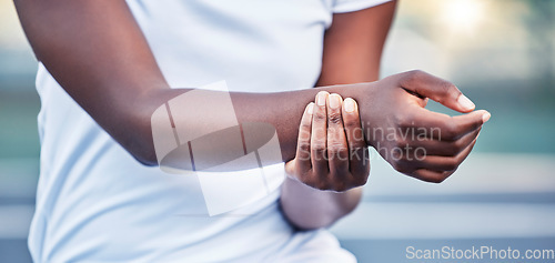 Image of Hands, wrist pain and injury after sport training, practice and holding arm outdoor. Massage after careless exercise, feeling swelling or workout for healthcare need for joints, first aid and painful