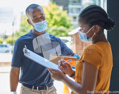 Image of Sign, covid and black woman with a delivery at the door with a happy delivery man in a face mask for safety compliance. Ecommerce, coronavirus and African girl customer with a clipboard for a box