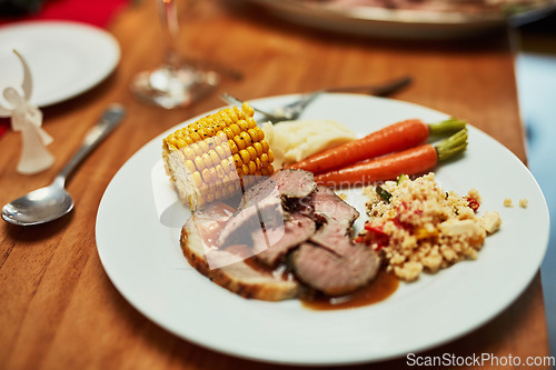 Image of Home cooking, plate of food and Christmas celebration at dinner table for healthy thanksgiving holiday. Setting for dinner party with vegetables, meat and salad, luxury lunch to celebrate vacation.