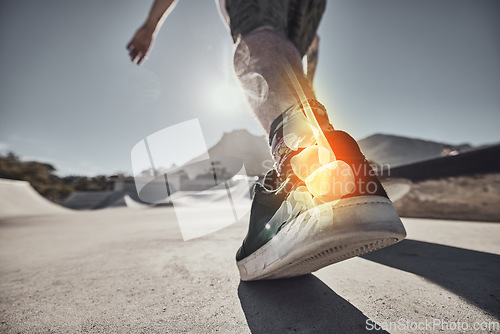 Image of Muscle pain, injury and leg of a skater at a park for exercise, sports and urban cardio. Fitness, training and x ray lighting of the bone and anatomy in the foot of a person skating in the city