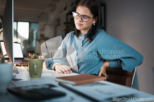 Image of Corporate, computer or business woman with back pain in office while working on laptop, research or planning. Worker, employee or manager suffering with accident at desk with anatomy or spine problem