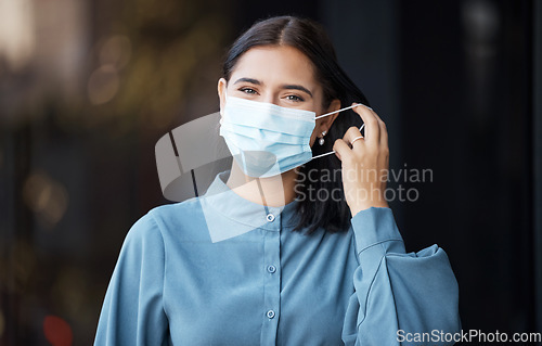 Image of Woman, covid and face mask removing for end of pandemic, freedom in healthcare safety on mockup. Portrait of female taking off protective mask in relief for corona virus ending on bokeh background