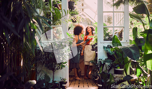 Image of Black women, tablet or laughing in plant shop, garden center or greenhouse in growth management, stock check or nature analysis. Smile, happy or florist teamwork on technology in small business store