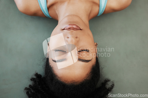 Image of Black woman, yoga and meditation training, calm mindset and zen balance on the floor, top view and chakra. Female wellness, mental health and praying with freedom, mindfulness and relax with faith