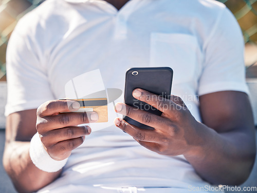 Image of Black man, hands and phone with credit card for online banking, ecommerce or remote transaction. Hand of shopper using mobile smartphone and card for banking app, digital payment or wireless purchase