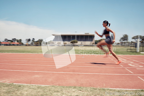 Image of Woman, fast runner and sports on stadium track for marathon training or exercise wellness. Athlete person, motion blur and running workout or fitness cardio, energy and speed or race performance
