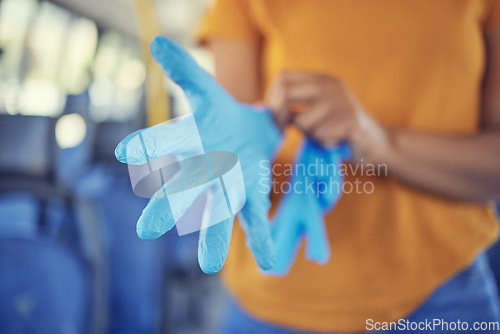 Image of Hand glove, covid safety and protection with cover for prevention and protection from covid 19, bacteria and disease in a pandemic. Health, wellness and public transport in a bus and travel in city