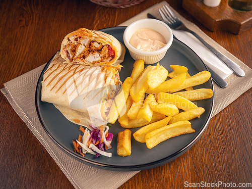 Image of Tortilla wrap with fried chicken