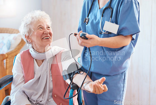 Image of Doctor, senior patient and blood pressure healthcare consulting in a retirement home. Medical support, professional caregiver and cardiology health consultation for elderly person in nursing home