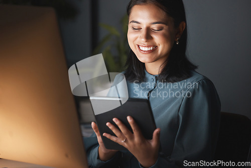 Image of Woman, tablet and happy on internet at night in office, working on digital marketing with mobile tech. Businesswoman smile, work and browser social media, web ux or online communication on app